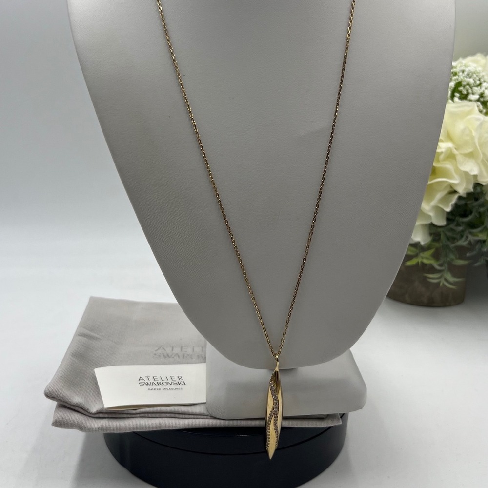 Atelier Swarovski Pave Crystal Gilded
Treasures Long Opera Pendant Necklace